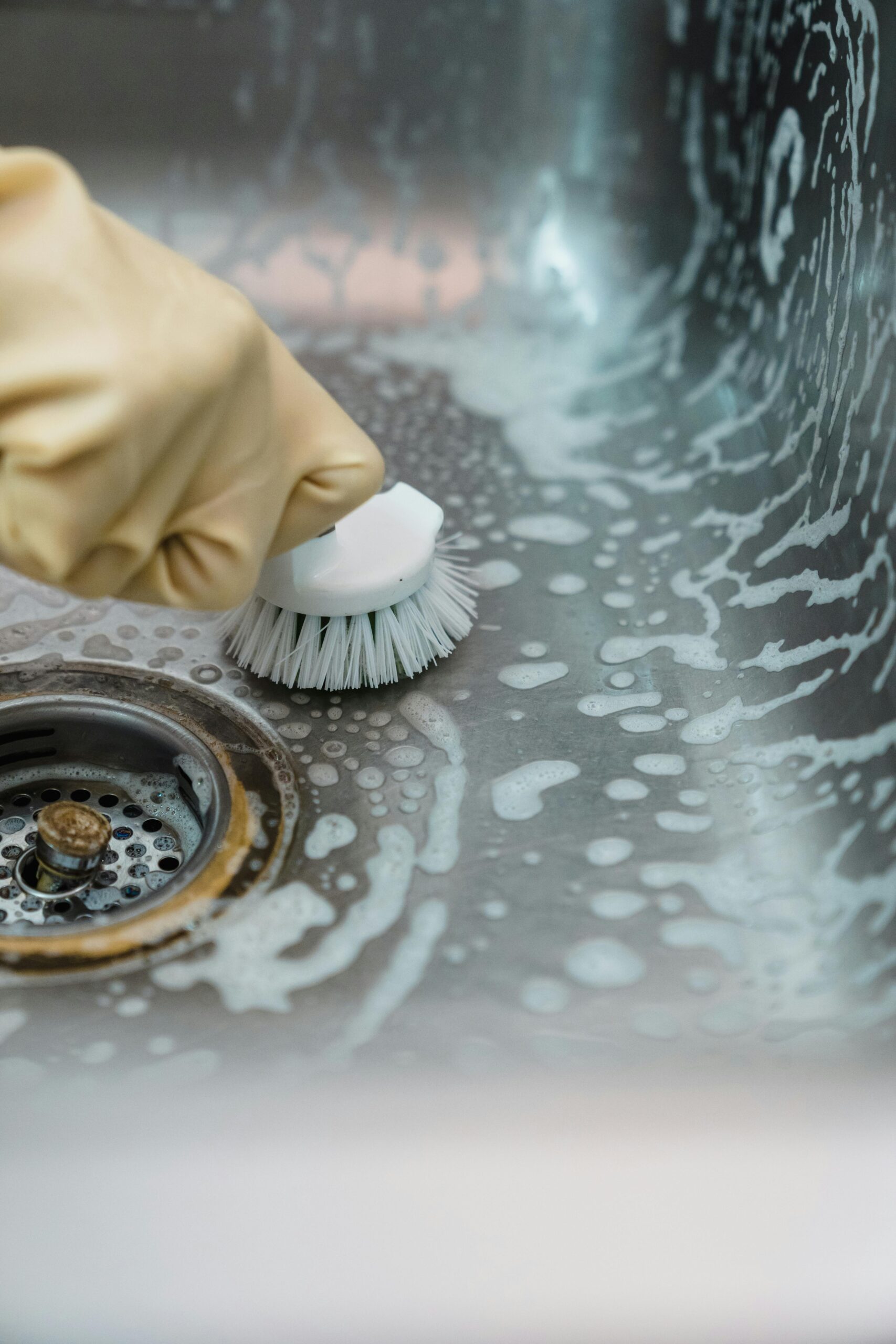 scrubbing a kitchen sink